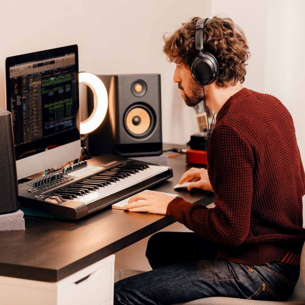 Voice actor creating character voices in audio production studio